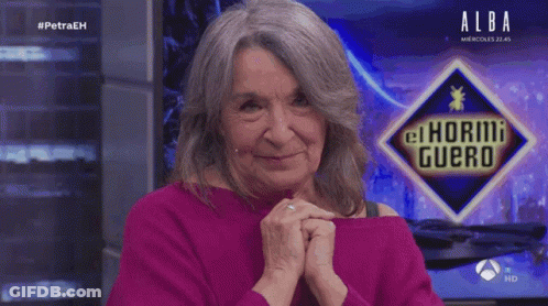 Woman Smiling In Front Of Alba Logo GIF