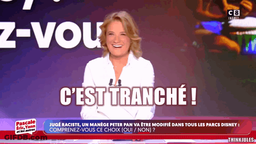Woman Smiling In Front Of Cest Tranche Screen GIF