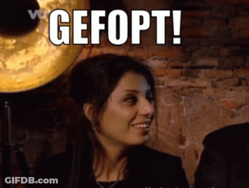 Woman Smiling In Front Of Gefopt Sign GIF
