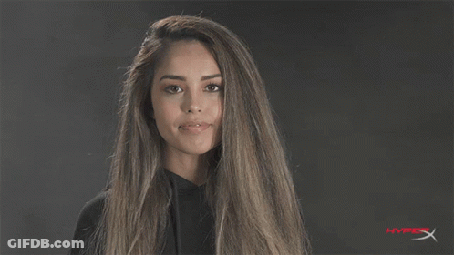 Woman Smiling In Front Of Hyper X Logo GIF