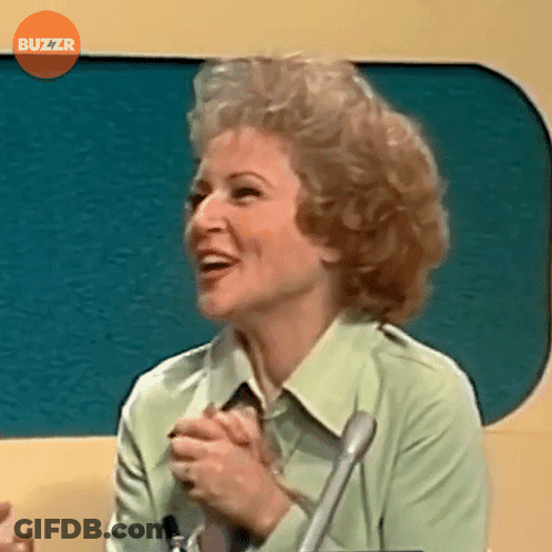 Woman Smiling In Front Of Microphone Buzzr GIF