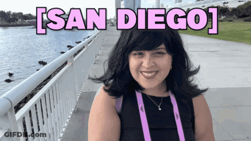 Woman Smiling In Front Of San Diego Sign GIF