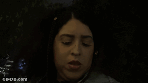 Woman Smiling In Front Of Shagarita Sign GIF