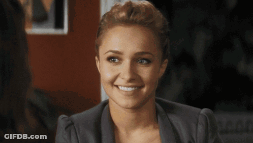 Woman Smiling In Front Of Striped Background GIF