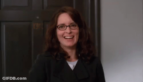 Woman Smiling In Glasses And Black Jacket GIF