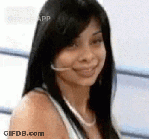 Woman Smiling In Headset GIF