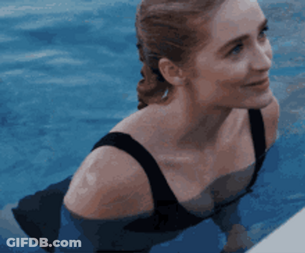 Woman Smiling In Pool GIF