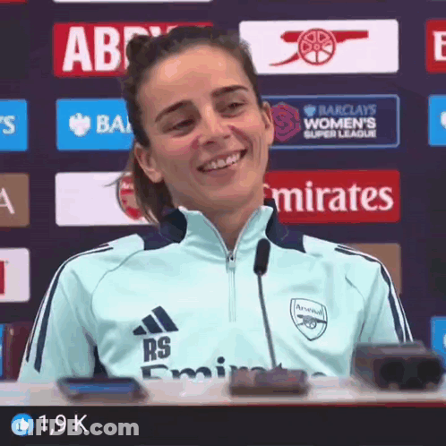 Woman Smiling In Soccer Jersey GIF