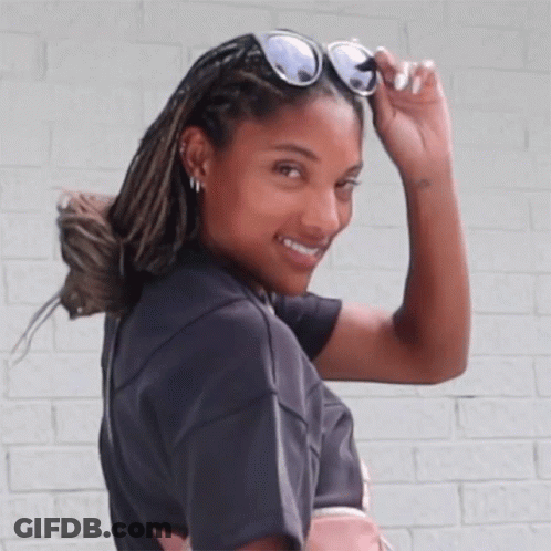 Woman Smiling In Sunglasses And Black Shirt GIF
