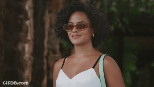 Woman Smiling In Sunglasses And White Top GIF