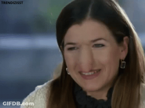 Woman Smiling In White Sweater GIF