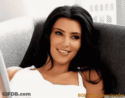 Woman Smiling In White Top GIF