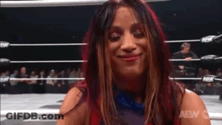 Woman Smiling In Wrestling Ring GIF
