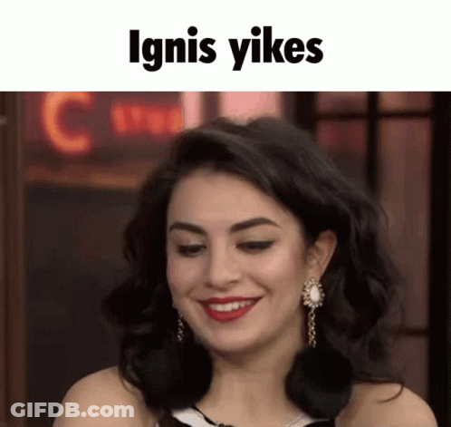 Woman Smiling Near Ignis Yikes Neon Sign GIF