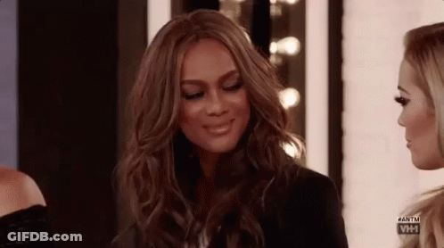 Woman Smiling Next To Another Woman GIF