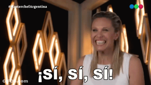Woman Smiling Next To Si Si Si Sign GIF