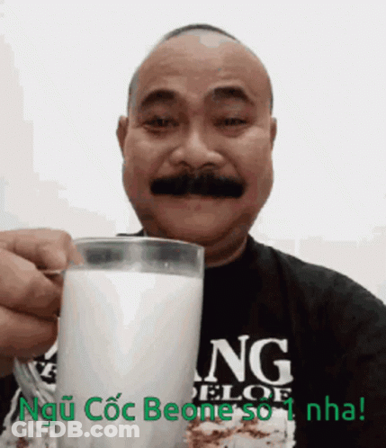 Woman Smiling Pointing At Camera Toddy GIF