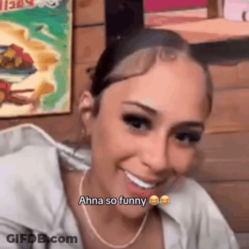 Woman Smiling Saying Ahna So Funny With Necklace GIF