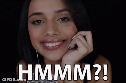 Woman Smiling Saying Hmm GIF