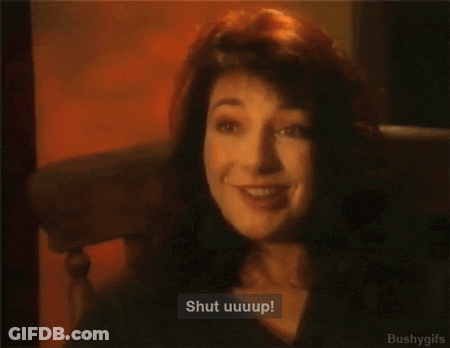 Woman Smiling Saying Shut Up GIF