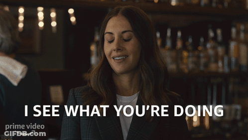 Woman Smiling Says I See What You're Doing GIF
