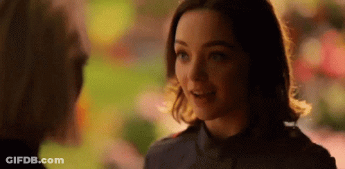 Woman Smiling Talking To Man GIF