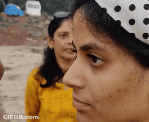 Woman Smiling With Eyes Closed GIF