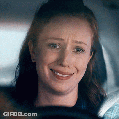 Woman Smiling With Eyes Closed In Car GIF