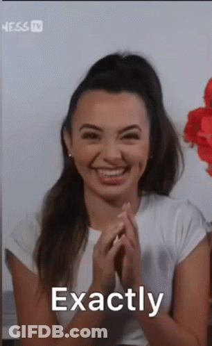 Woman Smiling With Folded Hands GIF