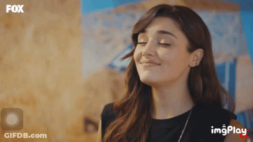 Woman Smiling With Fox Logo GIF