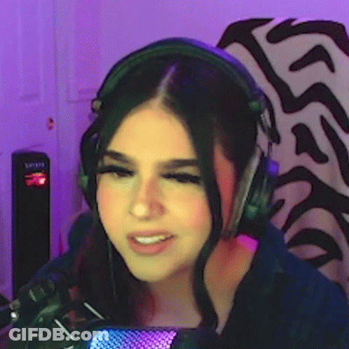 Woman Smiling With Headphones And Microphone GIF