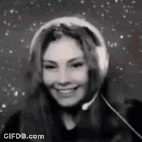 Woman Smiling With Headphones And Microphone GIF
