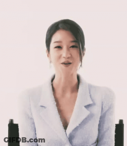 Woman Smiling With Hearts Coming Out Of Hair GIF