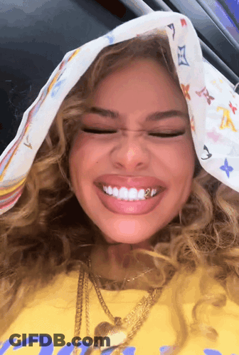 Woman Smiling With Louis Vuitton Scarf GIF