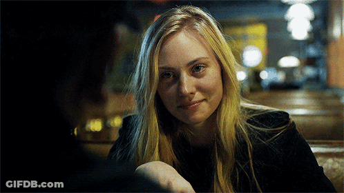Woman Smiling With Man At Table GIF