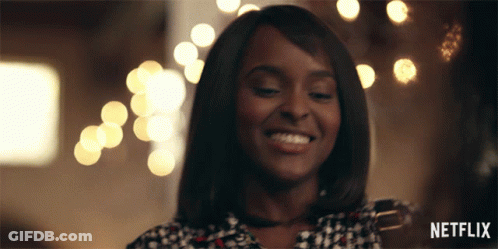 Woman Smiling With Netflix Logo GIF