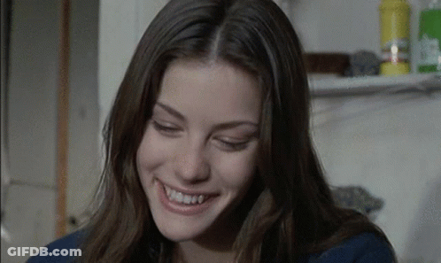 Woman Smiling With Teeth Showing GIF