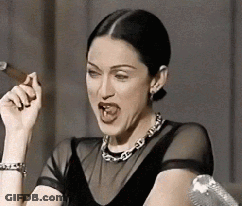 Woman Smoking Cigar With Tongue Out GIF