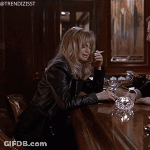 Woman Smoking Cigarette At Bar Trendizisst GIF