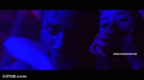 Woman Smoking Cigarette Next To Man With WorldStarHipHop GIF