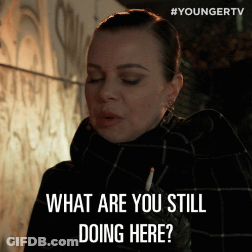 Woman Smoking Cigarette Saying What Are You Still Doing Here GIF