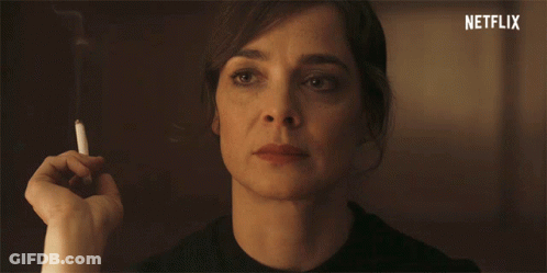 Woman Smoking Cigarette With Netflix Logo GIF