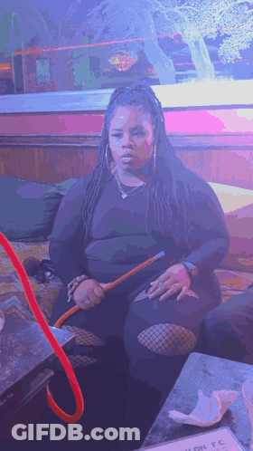 Woman Smoking Hookah With Nylon FC Sign GIF