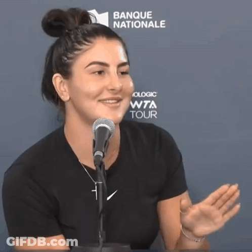 Woman Speaking Into Microphone Banque Nationale Sign GIF