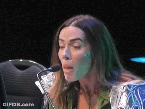 Woman Speaking Into Microphone Green Background GIF