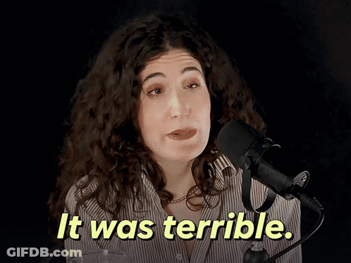 Woman Speaking Into Microphone Saying It Was Terrible GIF
