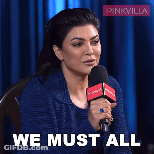Woman Speaking Into Microphone Saying We Must All GIF