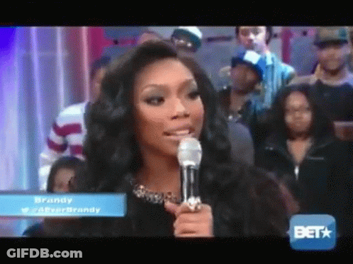 Woman Speaking Into Microphone With BET Logo GIF