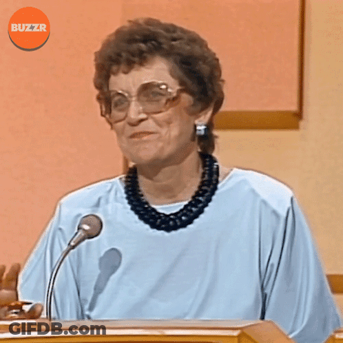 Woman Speaking Into Microphone With Buzzr GIF