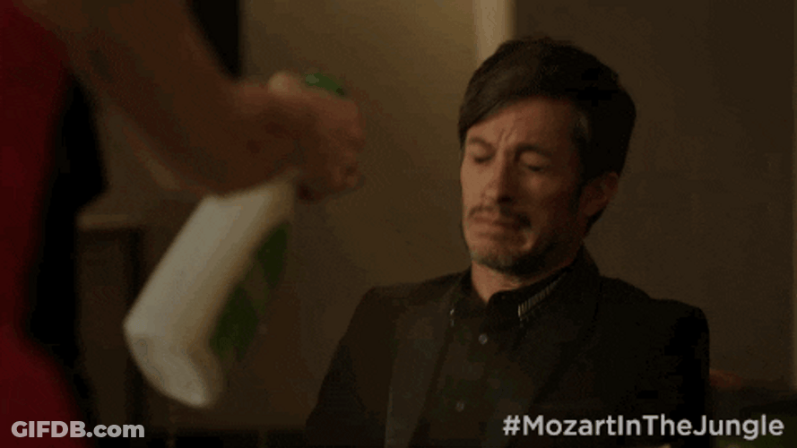Woman Spray Bottle Shaking Man GIF